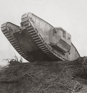A Tank Leads the Infantry into Action and Breaks Down the Wire Entanglements